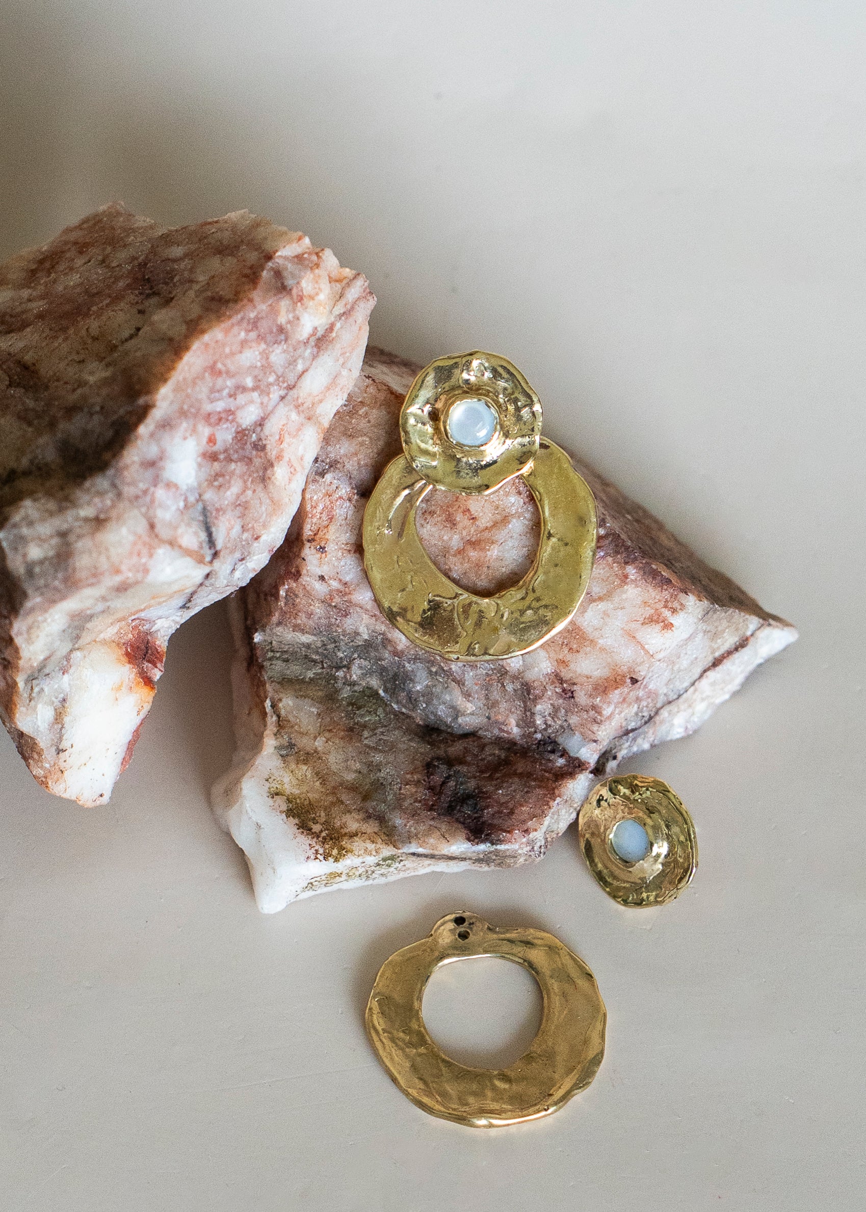 Ora studs and Cirque Jackets brass