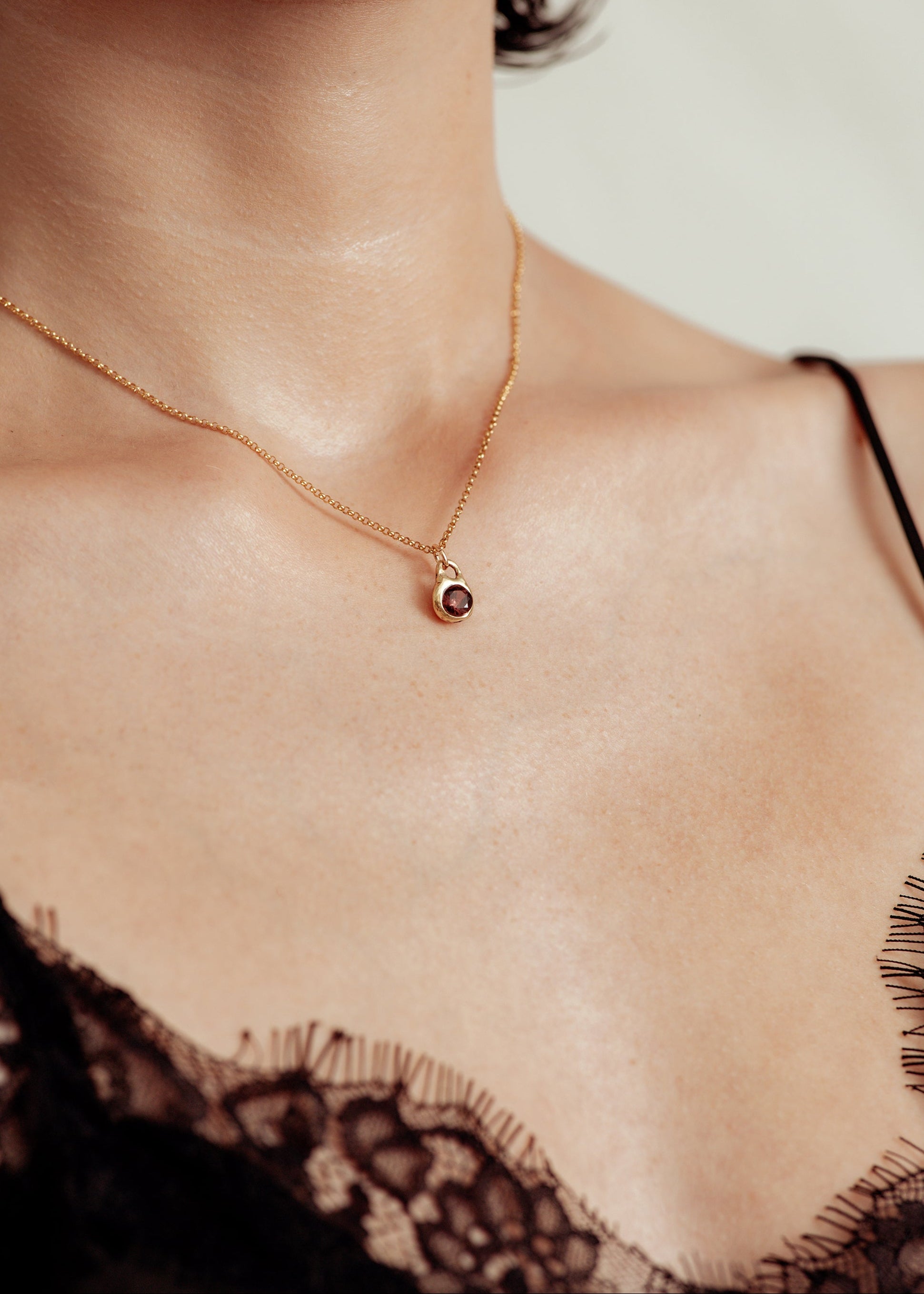Gold Solis Charm